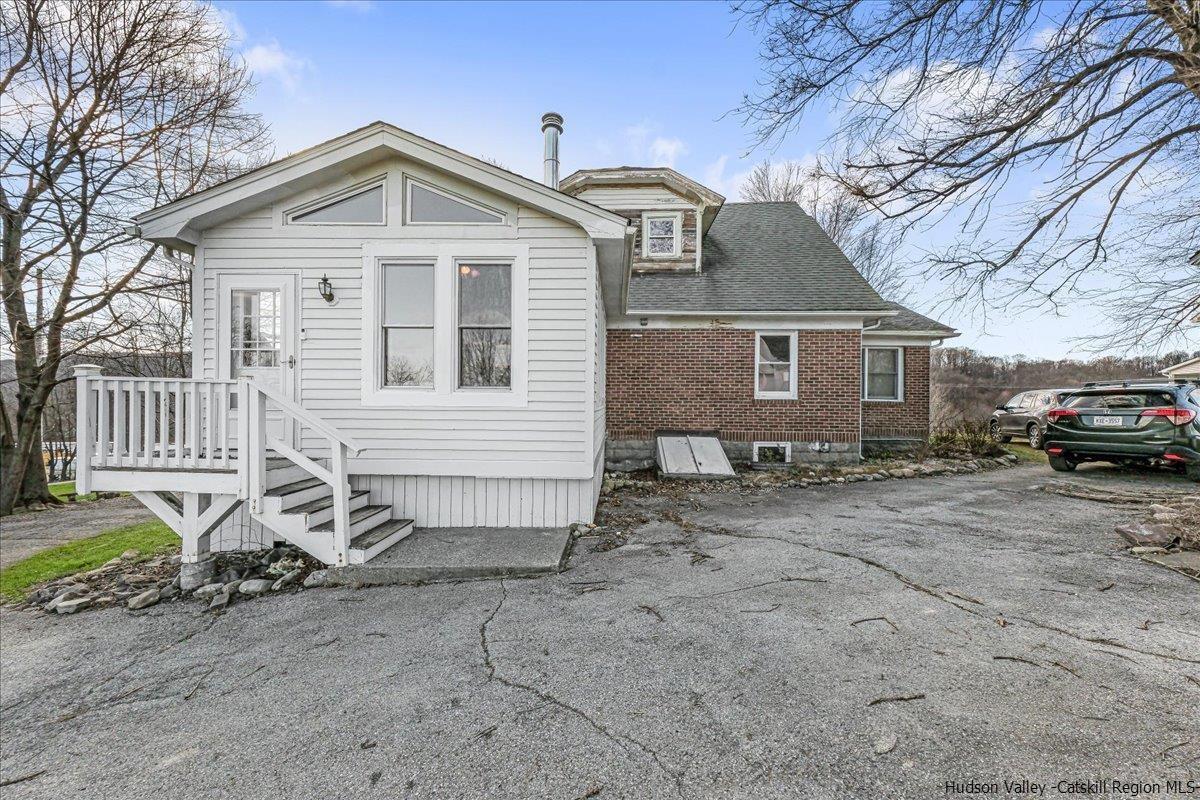 98 North Road Highland, NY 12528 - Photo 23 of 33 a front view of a house with a yard