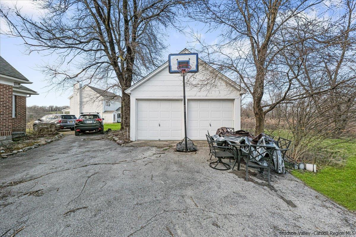 98 North Road Highland, NY 12528 - Photo 24 of 33 a car parked in front of white house
