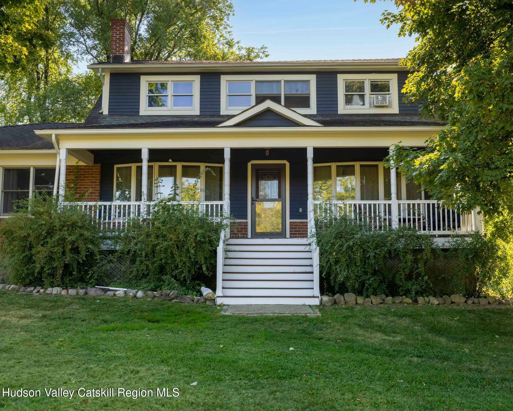 98 North Road Highland, NY 12528 - Photo 25 of 33 a front view of a house with a garden