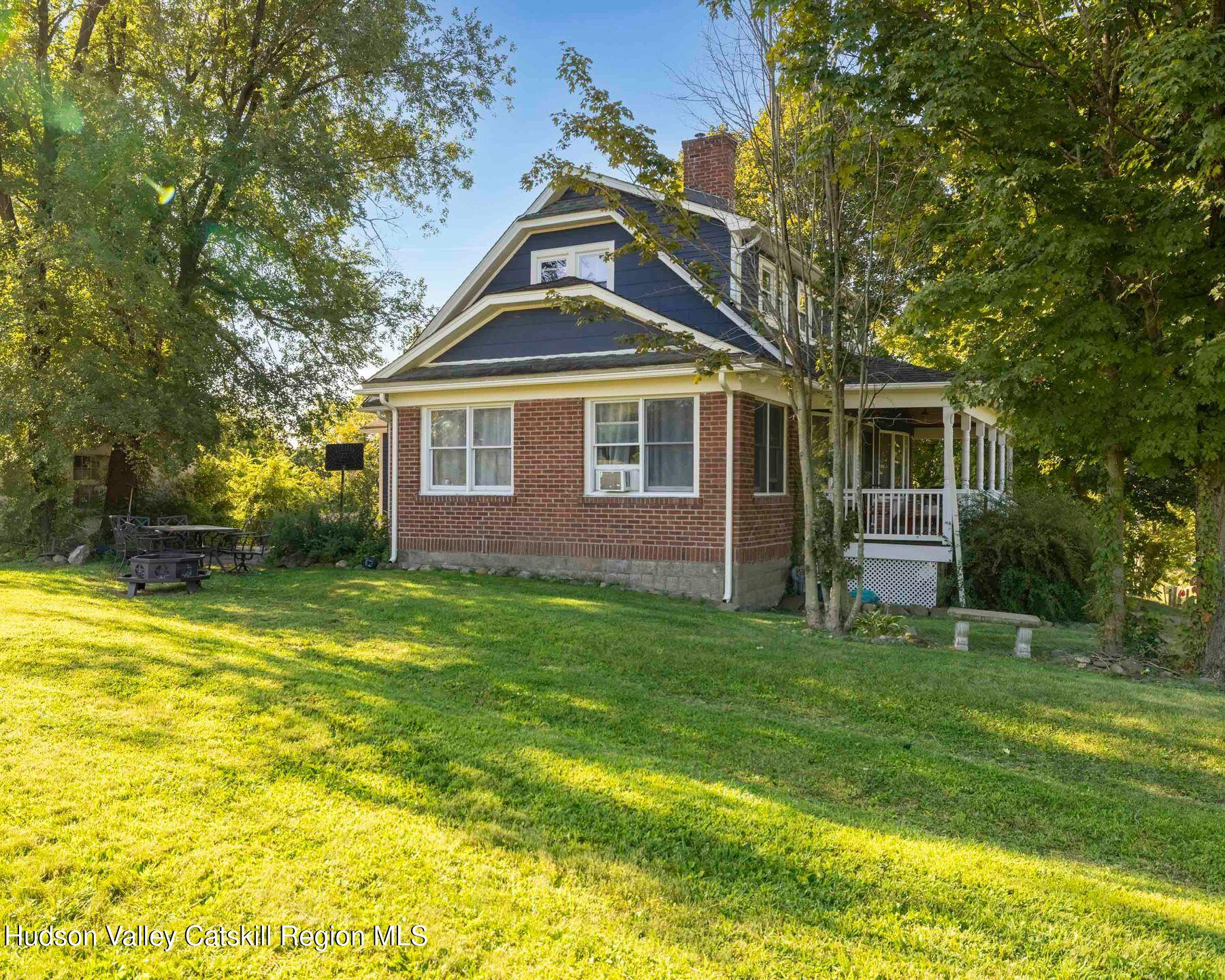 98 North Road Highland, NY 12528 - Photo 27 of 33 a front view of a house with a yard