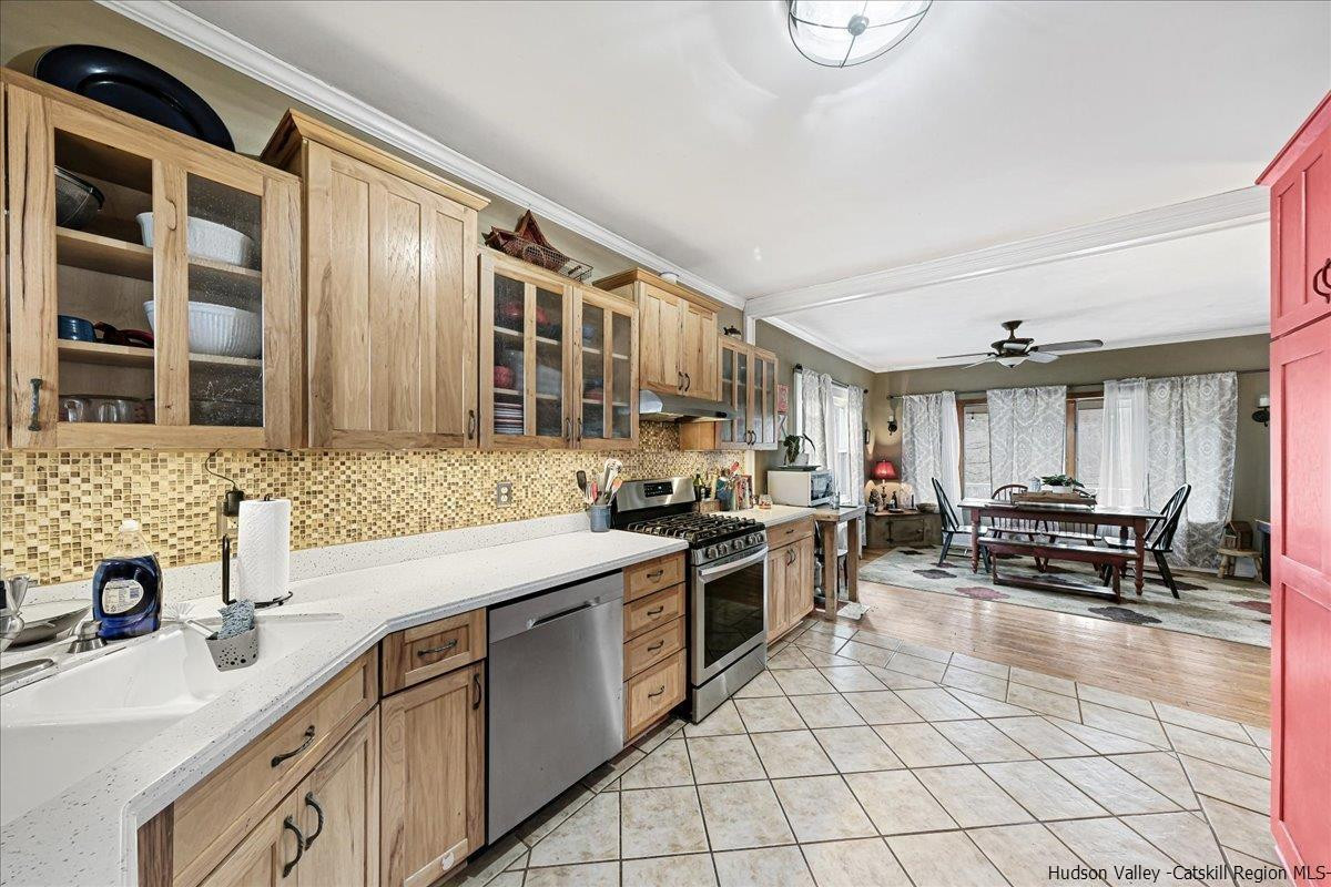 98 North Road Highland, NY 12528 - Photo 8 of 33 a kitchen with stainless steel appliances granite countertop a sink stove and cabinets