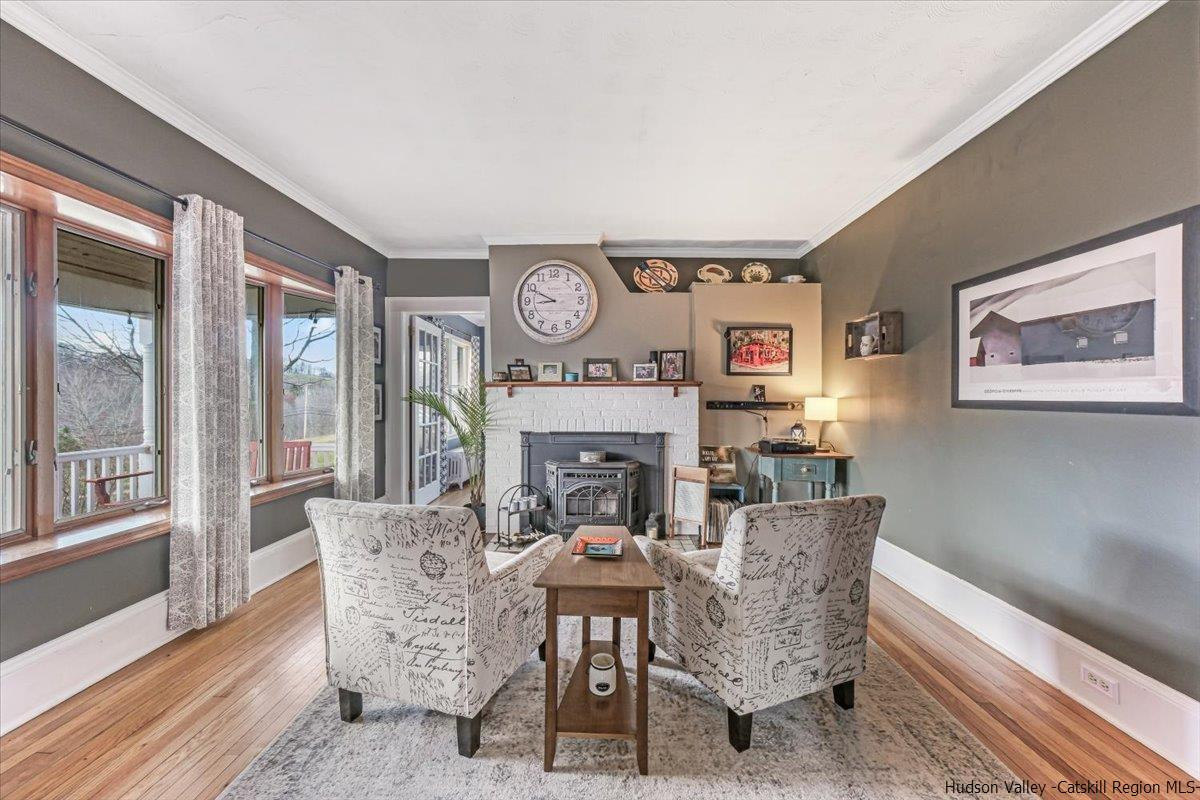 98 North Road Highland, NY 12528 - Photo 9 of 33 a view of a dining room with furniture window and wooden floor