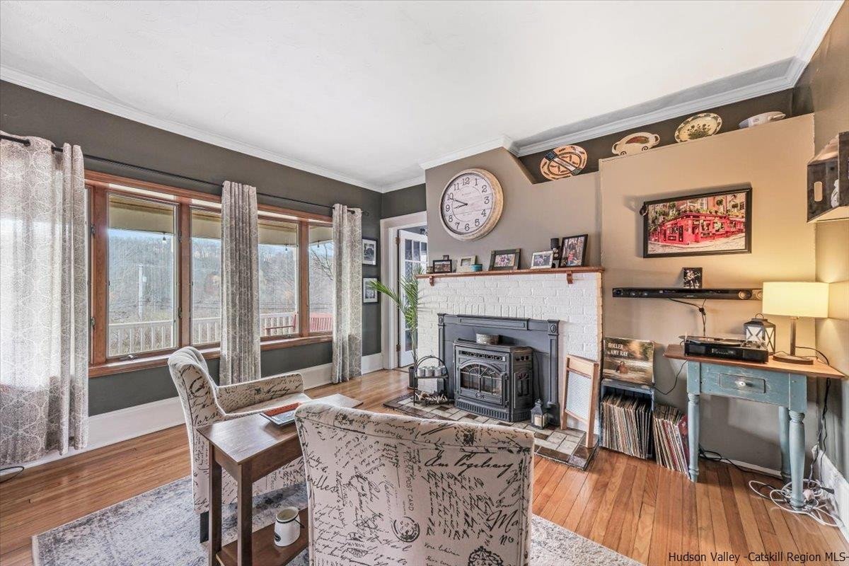 98 North Road Highland, NY 12528 - Photo 10 of 33 a living room with furniture and a fireplace
