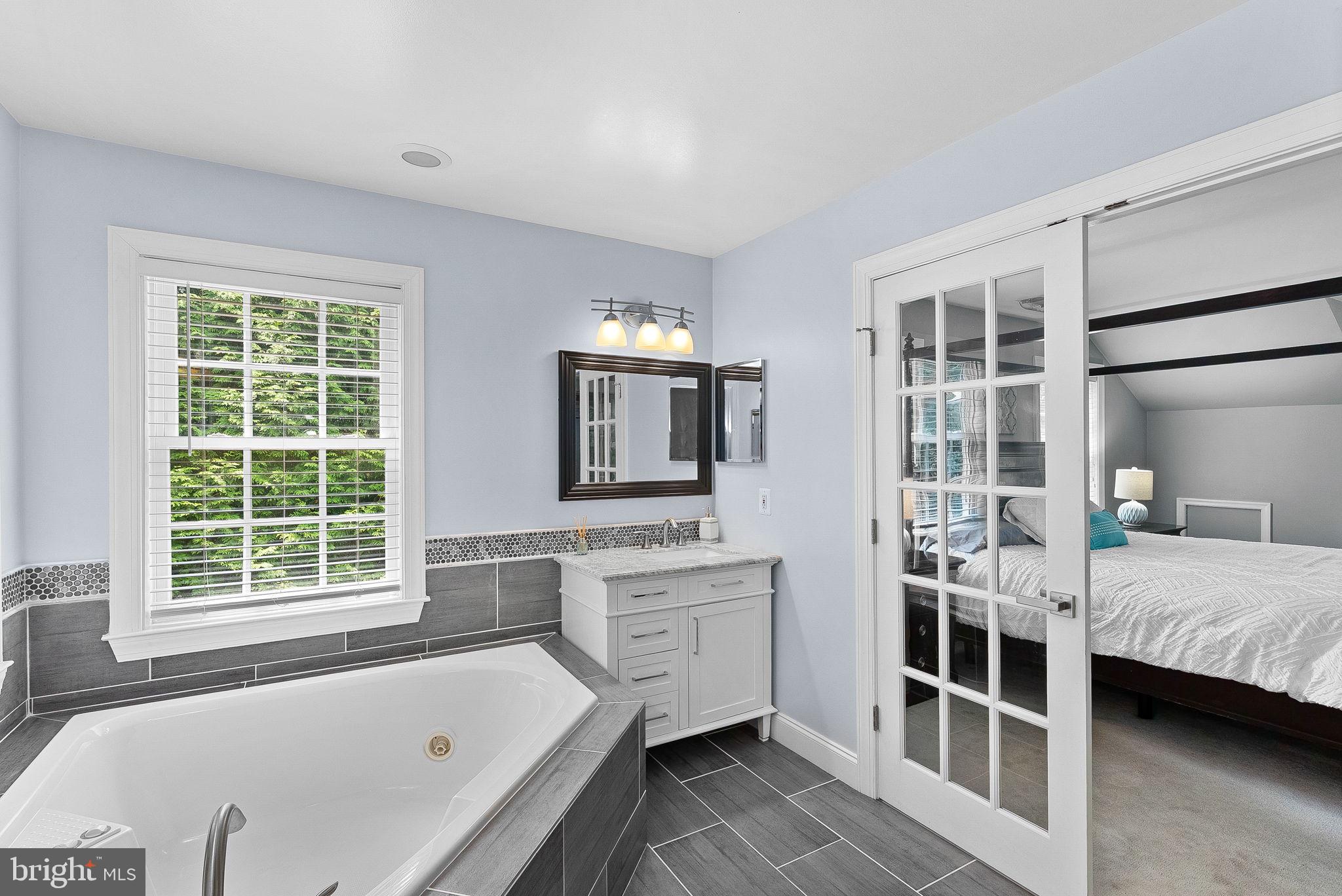 7214 Calamo Street Springfield, VA 22150 - Photo 50 of 77 Primary bath with natural light