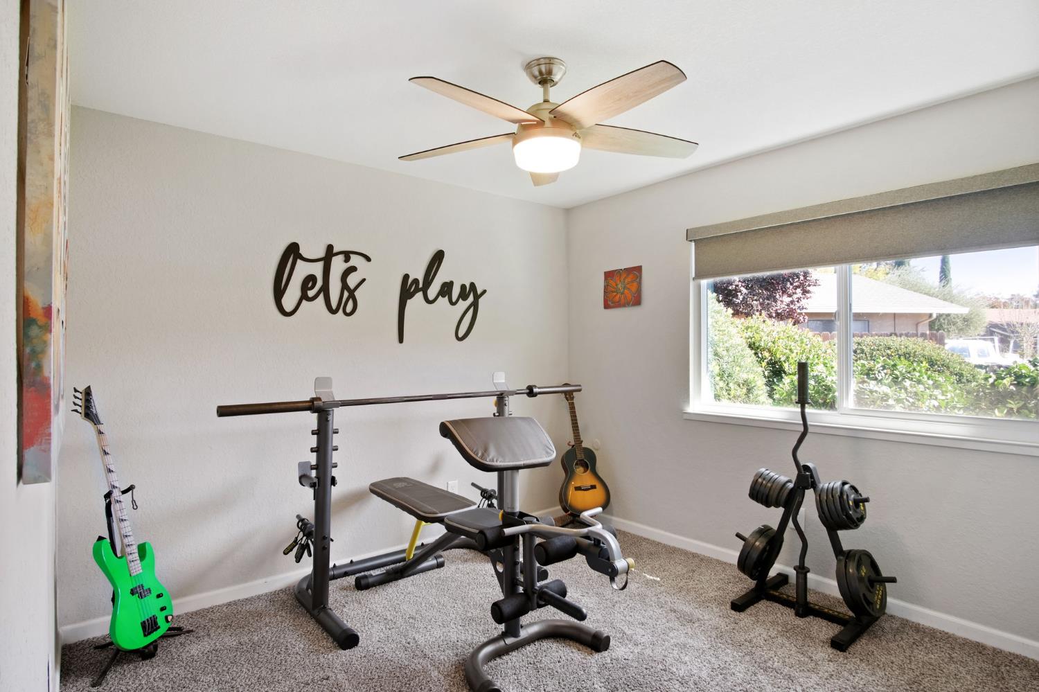 3161 Bridgeport Court Turlock, CA 95382 - Photo 11 of 31 a view of a workspace with furniture and a window