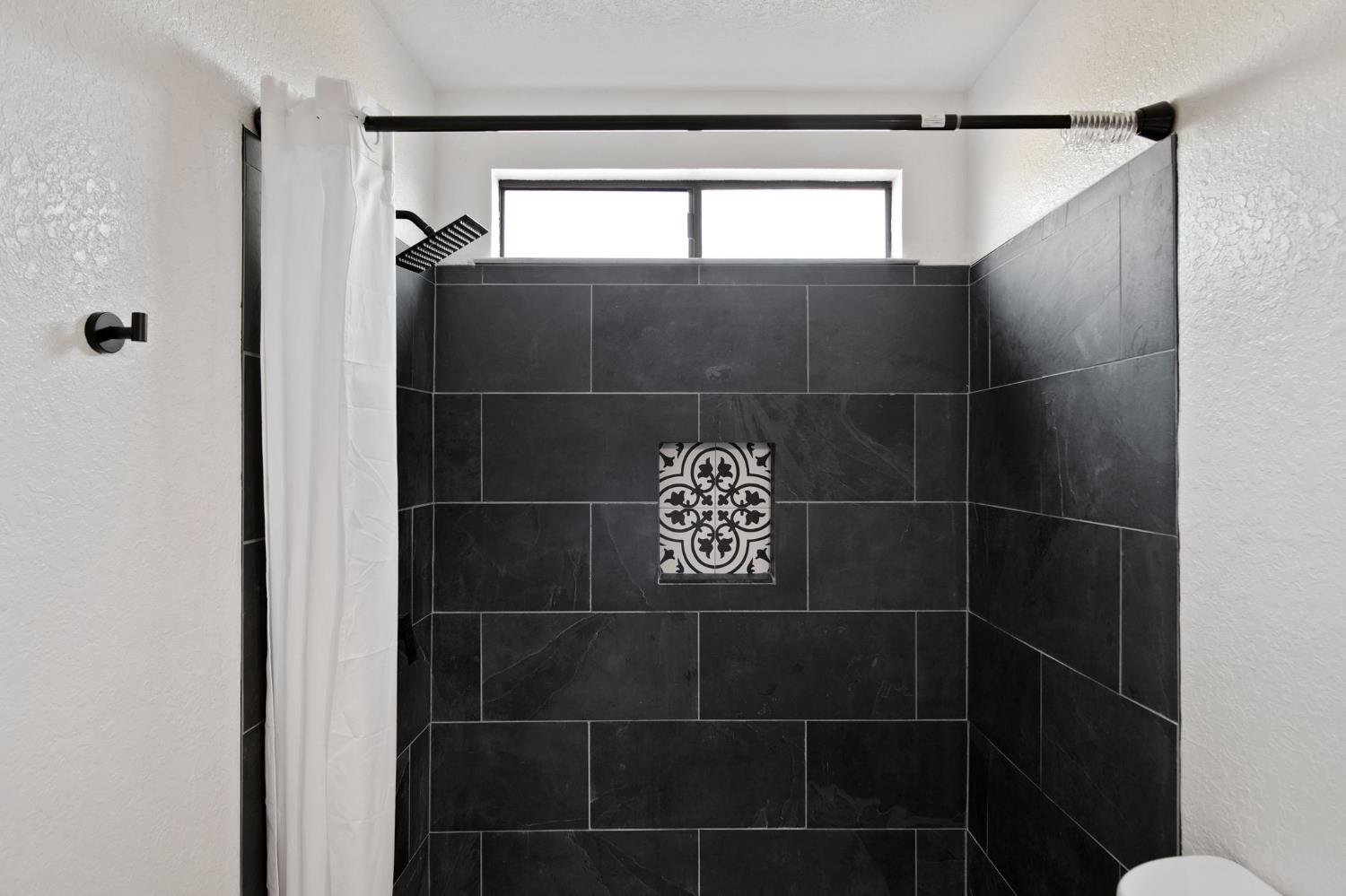 3161 Bridgeport Court Turlock, CA 95382 - Photo 14 of 31 a bathroom with a shower