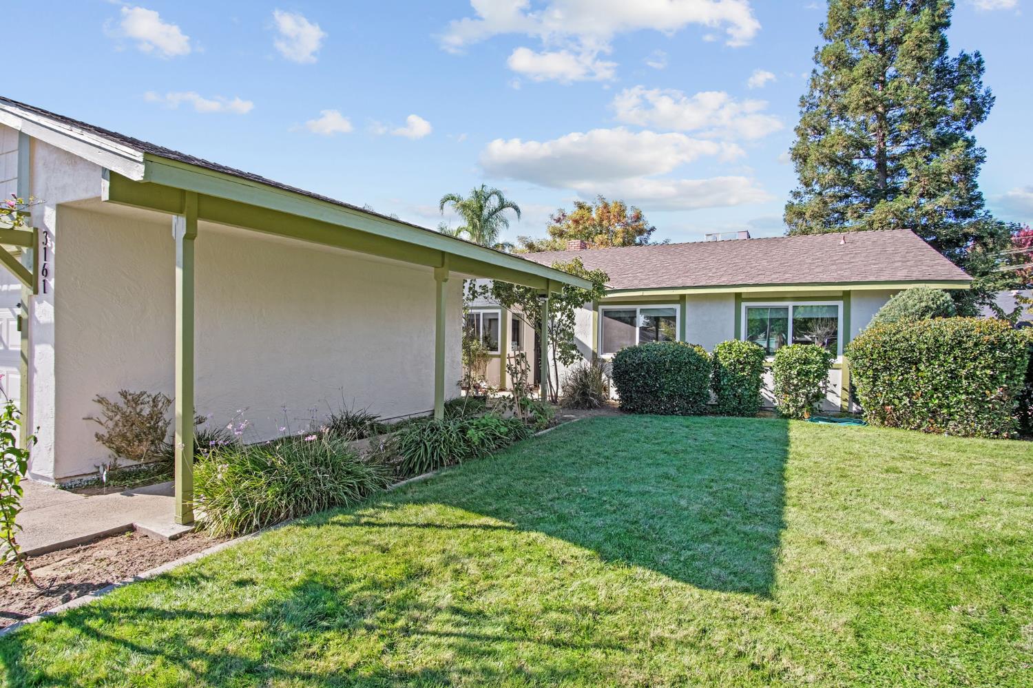 3161 Bridgeport Court Turlock, CA 95382 - Photo 6 of 31 a front view of a house with garden
