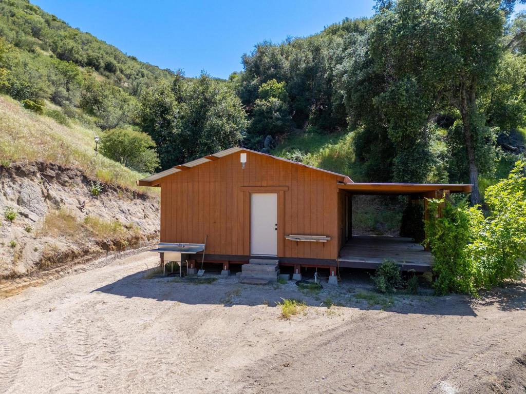 63-acres San Felipe Road Warner Springs, CA 92086 - Photo 24 of 43 a backyard of a house with yard and outdoor seating