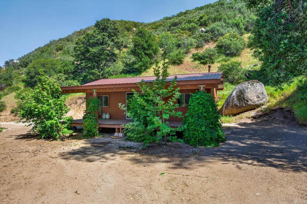 63-acres San Felipe Road Warner Springs, CA 92086 - Photo 4 of 43 a front view of a house with garden