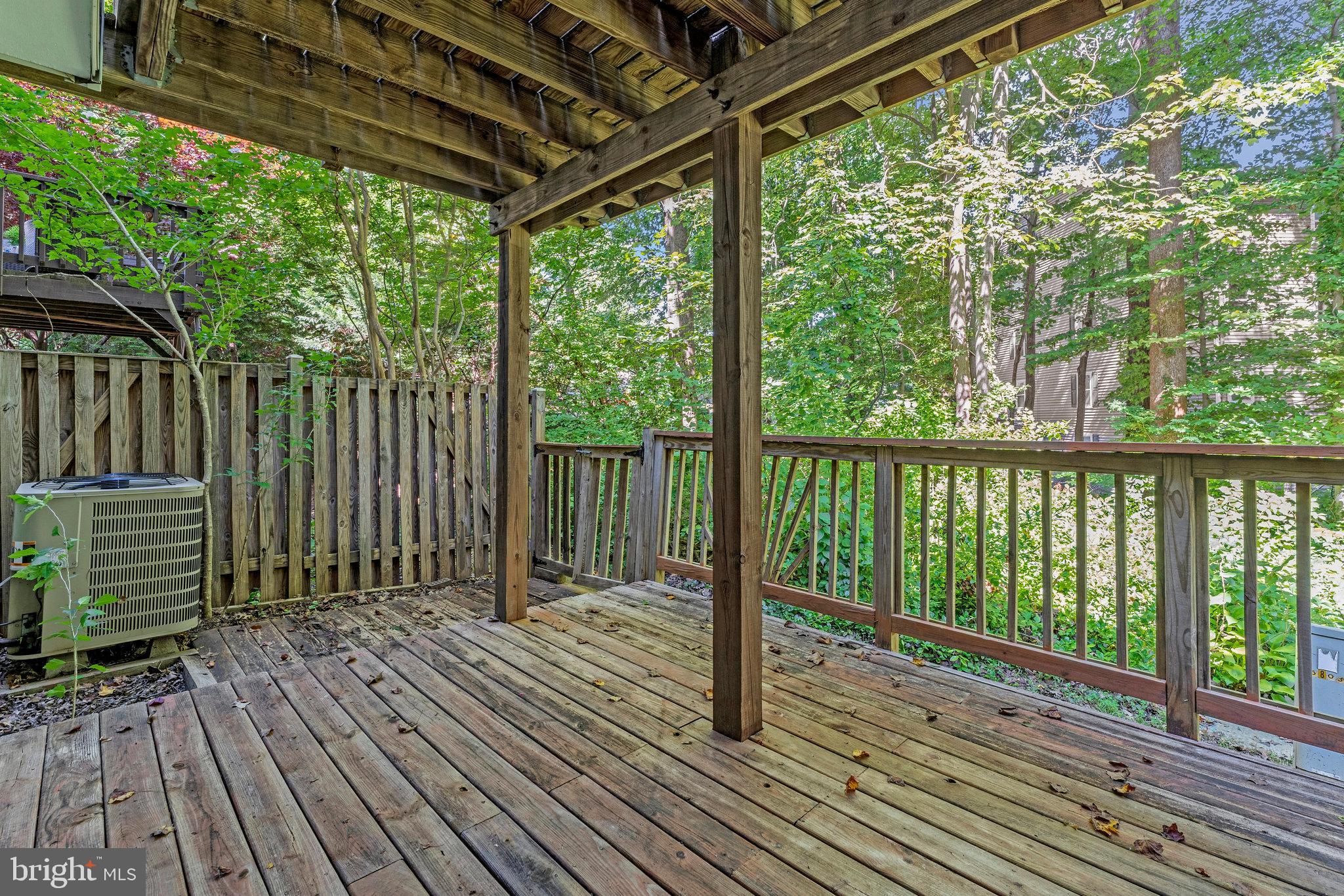 5803 Walden Commons Court Burke, VA 22015 - Photo 13 of 20 a view of backyard with green space