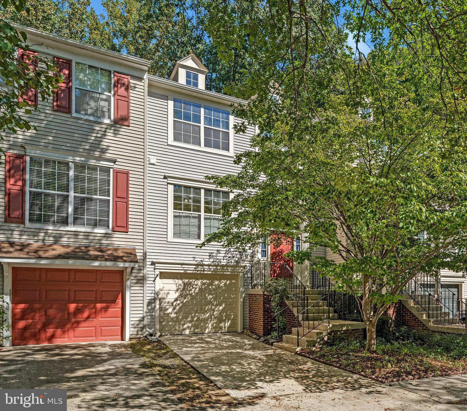5803 Walden Commons Court Burke, VA 22015 - Photo 6 of 20 a view of a house with a yard