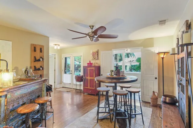 a en suite bathroom with a double vanity sink a mirror and shower
