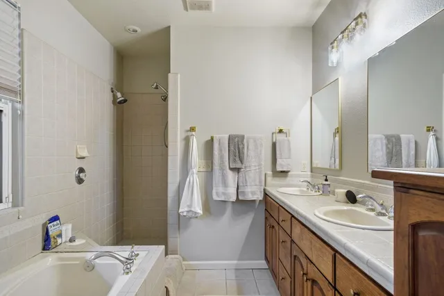 a bathroom with a sink and a bathtub