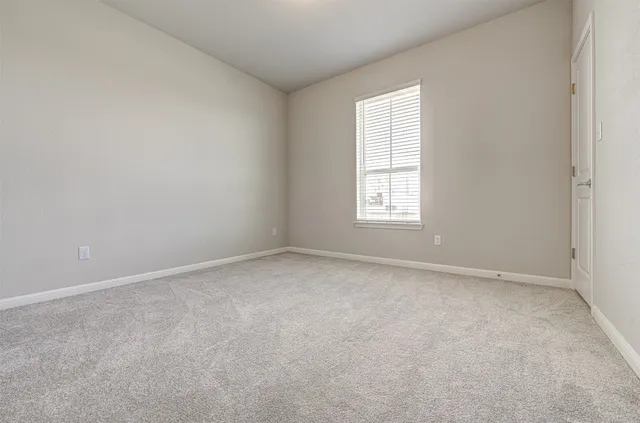 a view of hallway with white walls