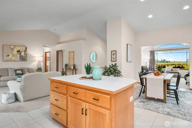 a kitchen with a stove top oven sink and cabinets