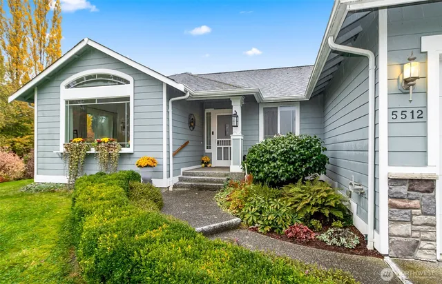 an aerial view of houses with yard