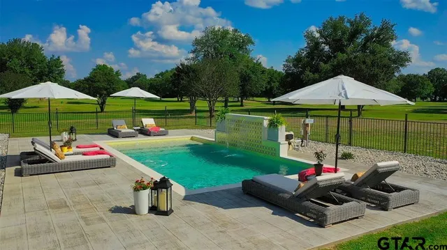 a garden view with a seating space