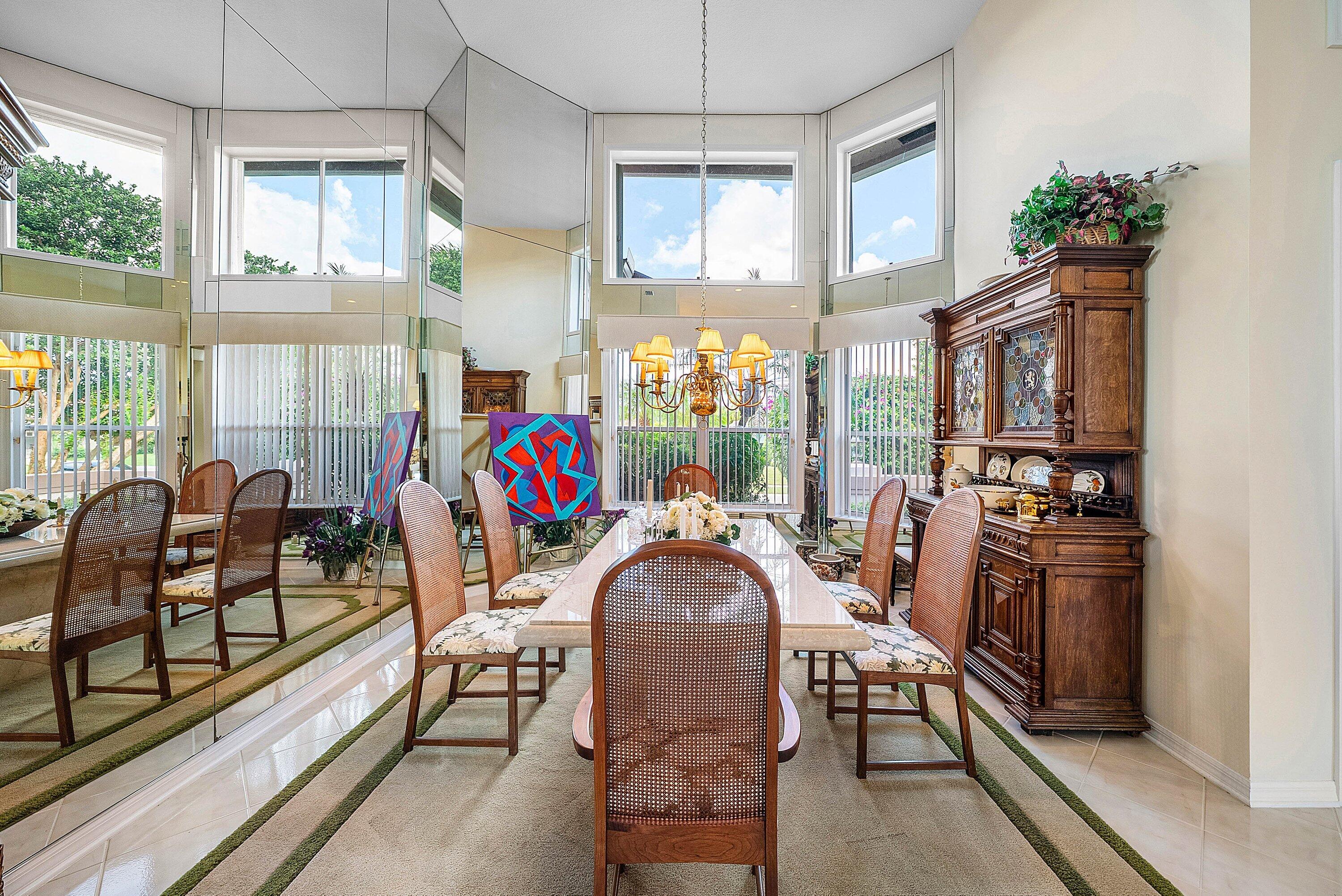 7142 Montrico Drive Boca Raton, FL 33433 - Photo 13 of 59 a view of a dining room with furniture window and outside view