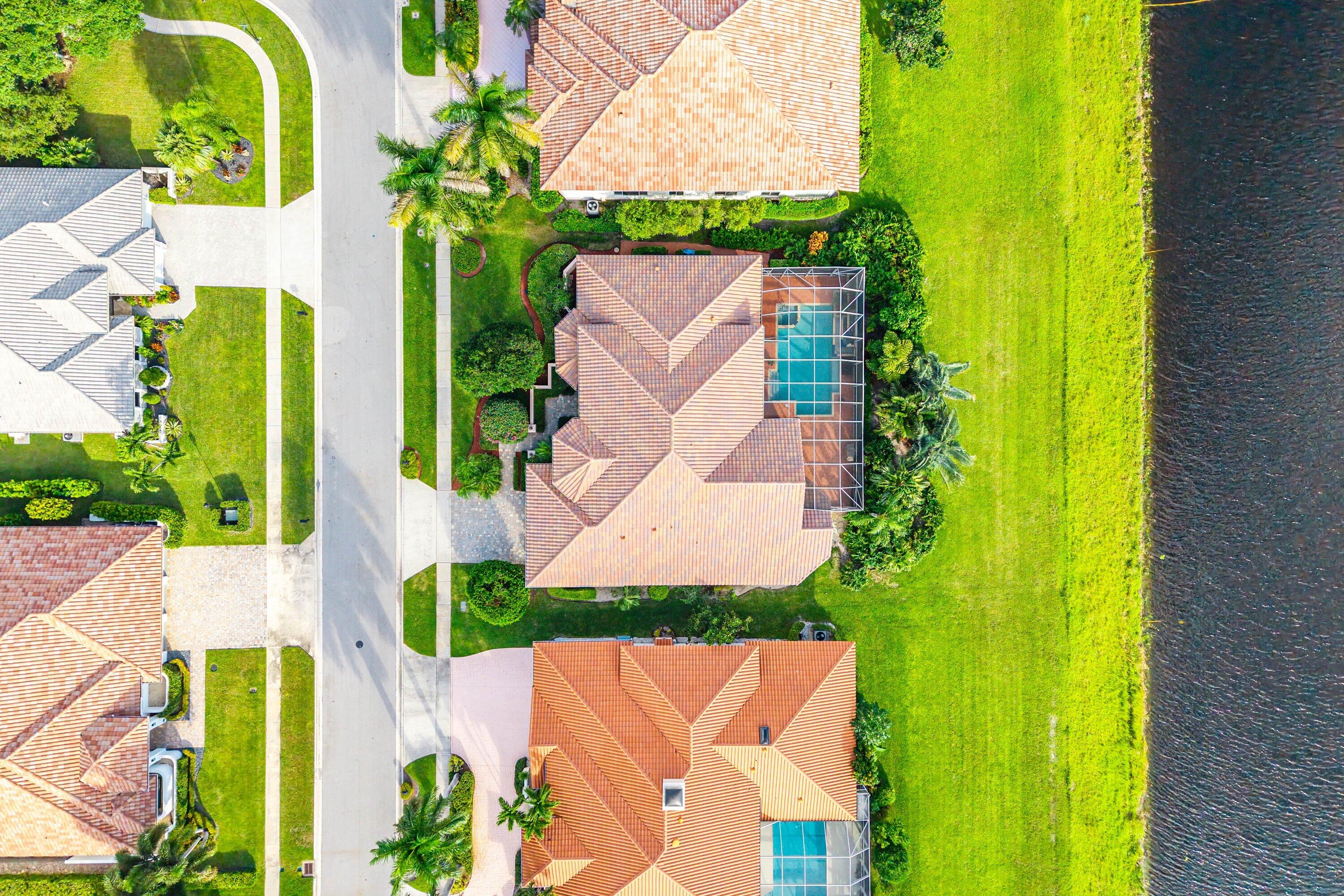 7142 Montrico Drive Boca Raton, FL 33433 - Photo 49 of 59 an aerial view of a house with a swimming pool