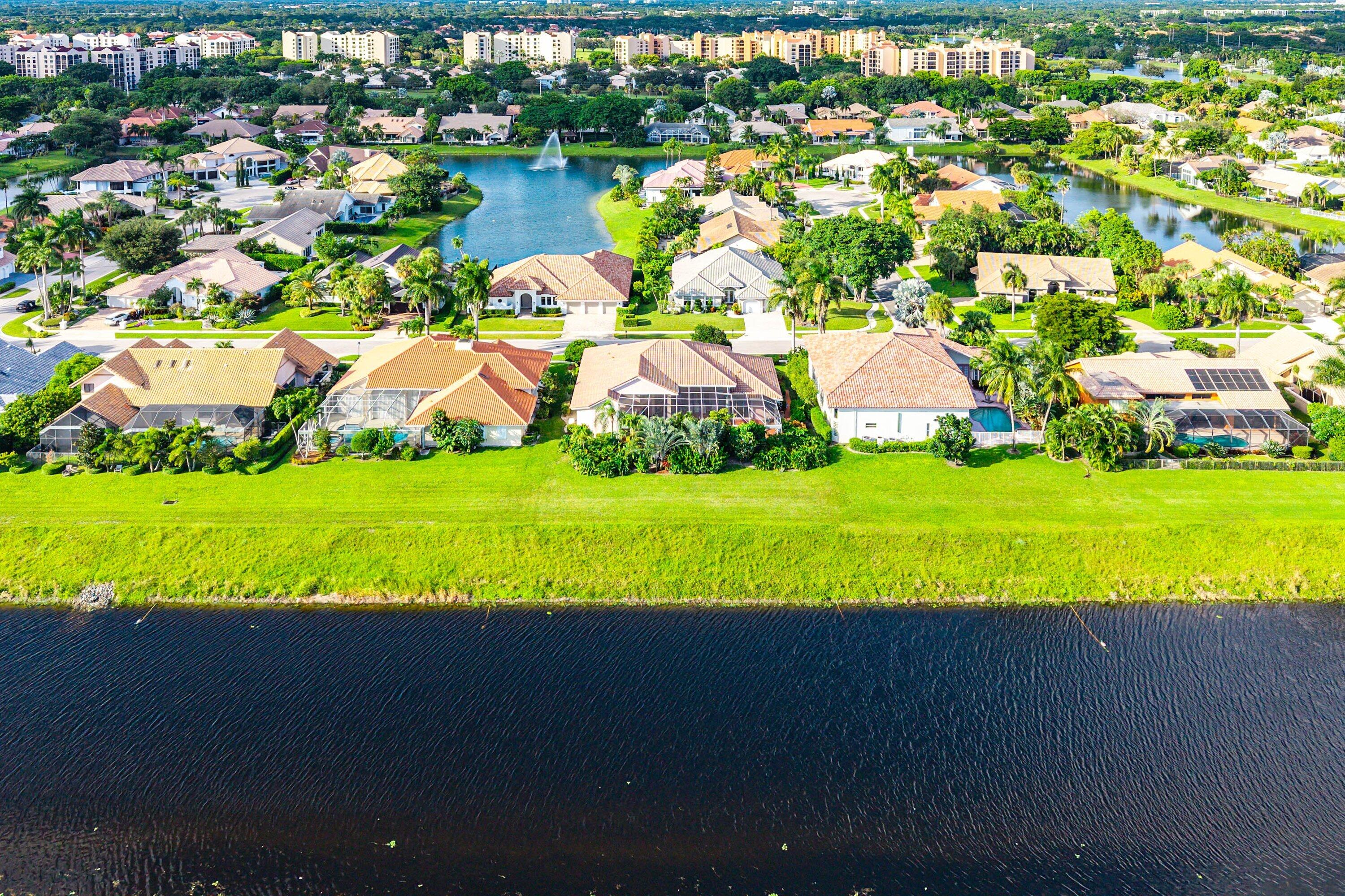 7142 Montrico Drive Boca Raton, FL 33433 - Photo 53 of 59 a view of an outdoor space and swimming pool
