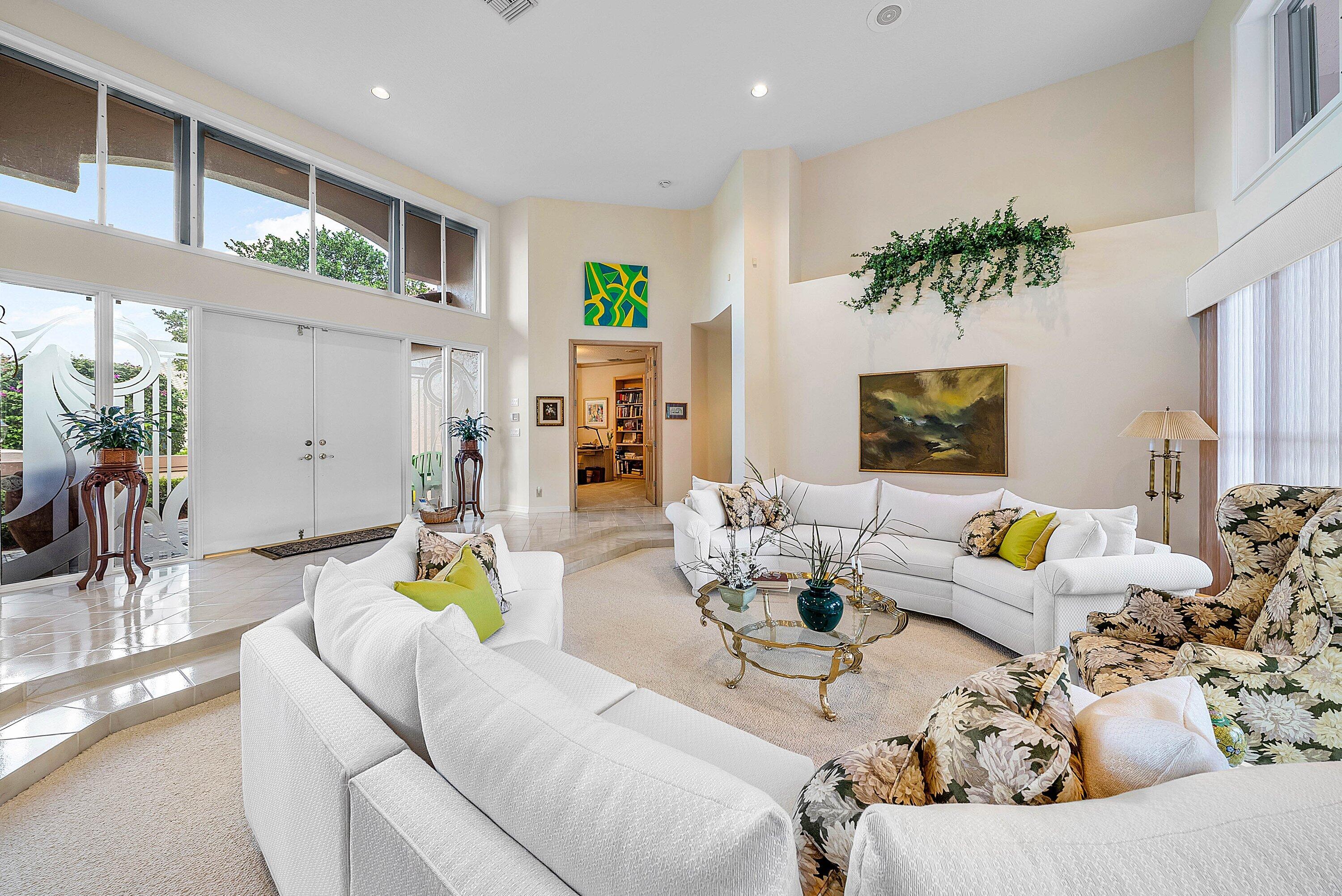 7142 Montrico Drive Boca Raton, FL 33433 - Photo 10 of 59 a living room with furniture and a large window