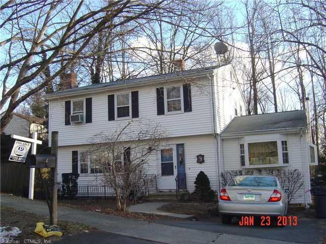 6 Ridgehollow Road West Haven, CT 06516 - Photo 1 of 1 a car parked in front of white house