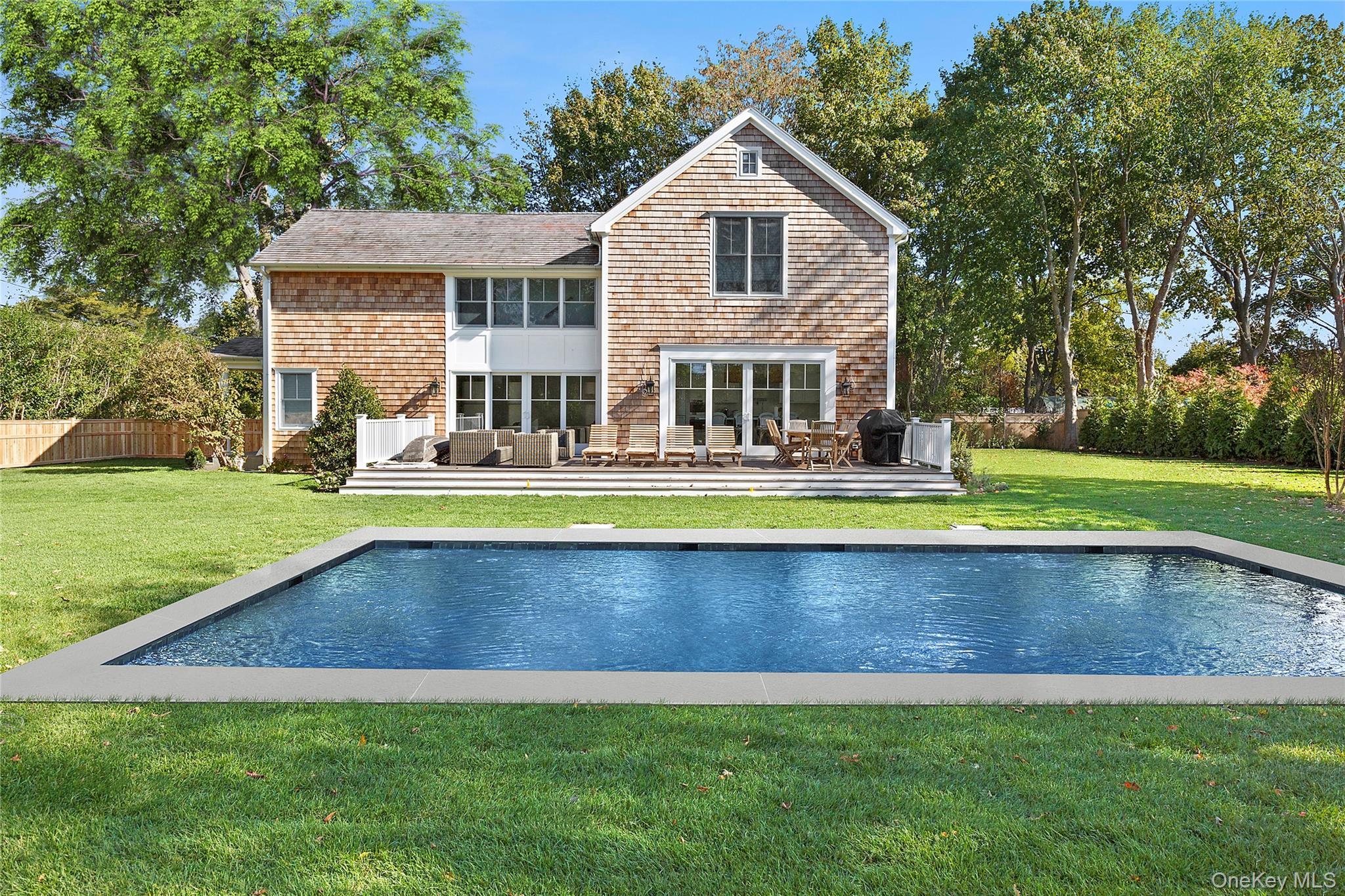 96 Miller Road Southampton, NY 11968 - Photo 15 of 18 a view of outdoor space yard and swimming pool