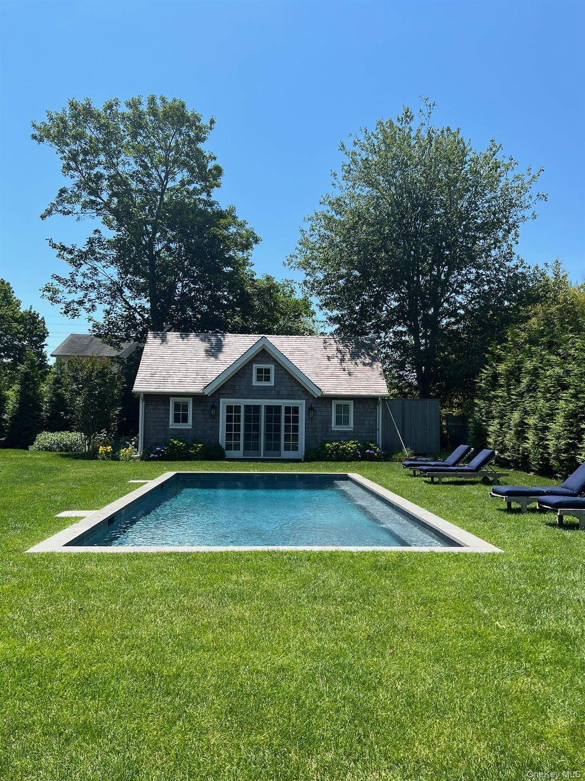 96 Miller Road Southampton, NY 11968 - Photo 18 of 18 a view of a house with a yard