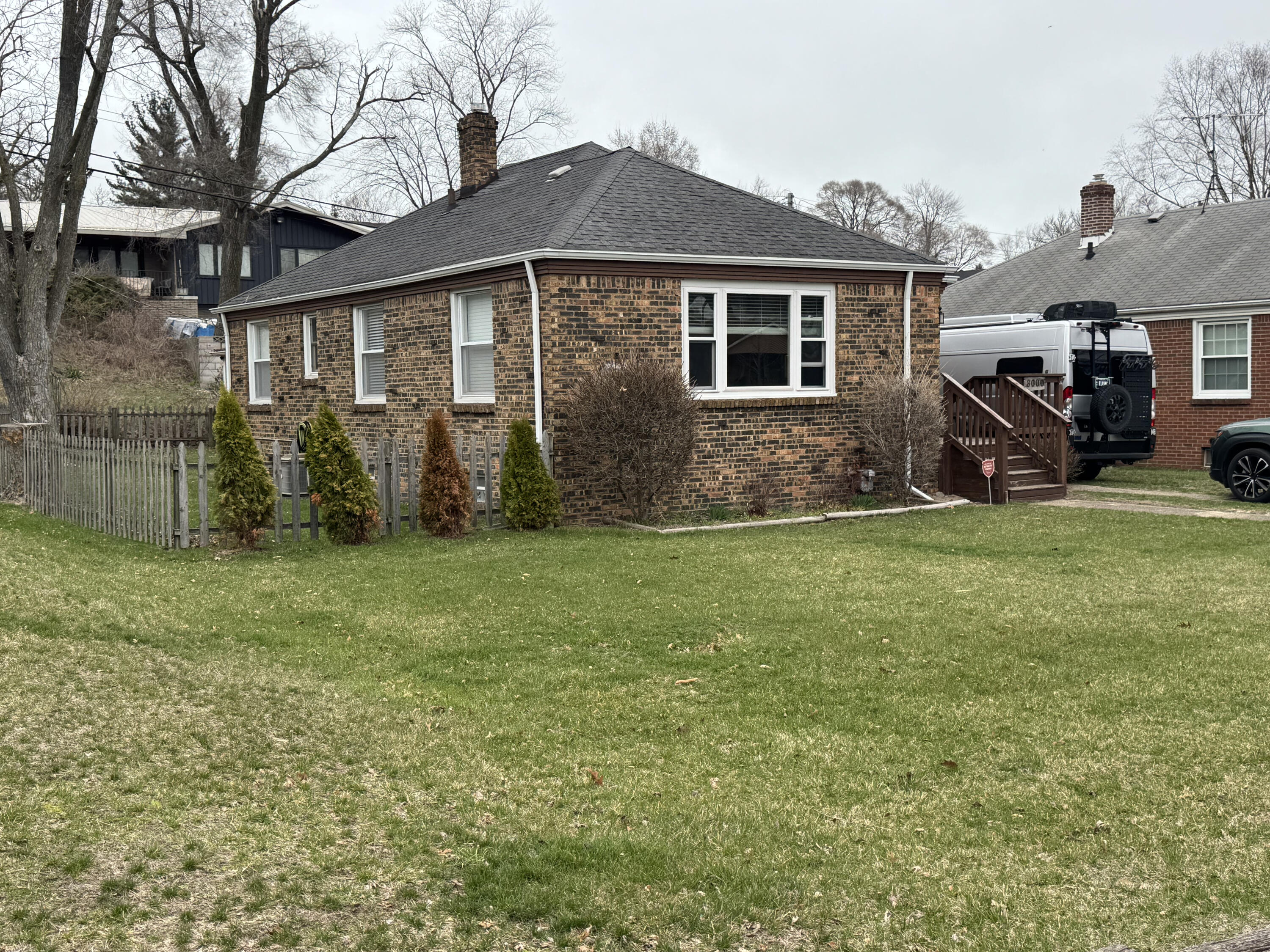 8000 Maple Avenue Gary, IN 46403 - Photo 1 of 1 a front view of a house with a yard