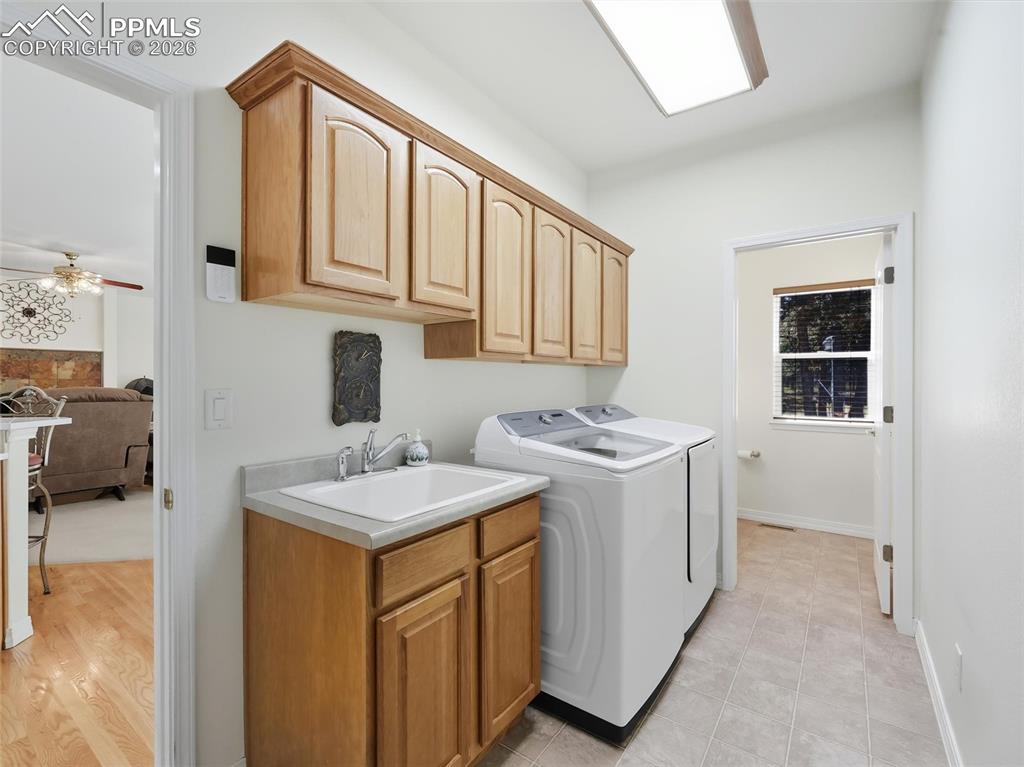 12855 Murphy Road Elbert, CO 80106 - Photo 21 of 50 a utility room with dryer and washer