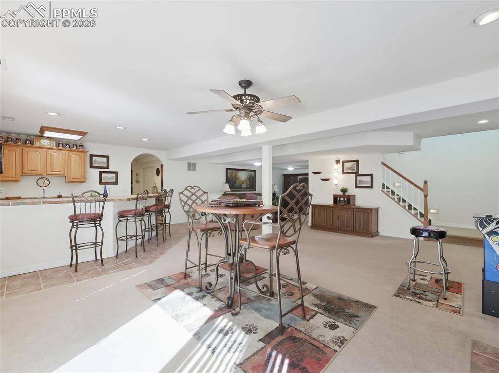 12855 Murphy Road Elbert, CO 80106 - Photo 24 of 50 a living room with lots of furniture and view of kitchen