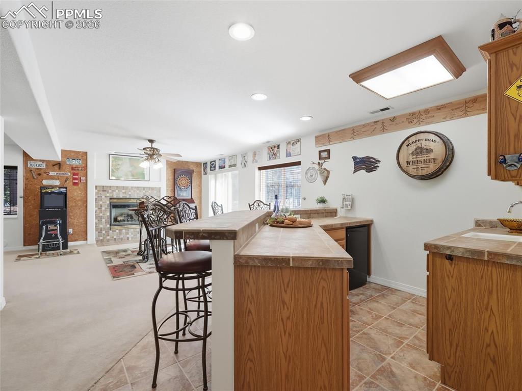 12855 Murphy Road Elbert, CO 80106 - Photo 25 of 50 a kitchen with a table and chairs