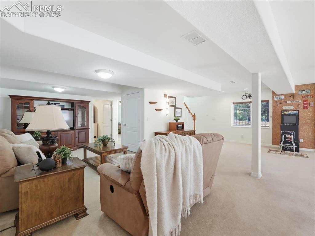 12855 Murphy Road Elbert, CO 80106 - Photo 26 of 50 a living room with furniture and a window