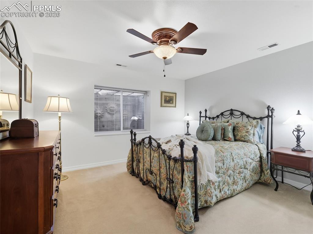 12855 Murphy Road Elbert, CO 80106 - Photo 33 of 50 a bedroom with bed and a window