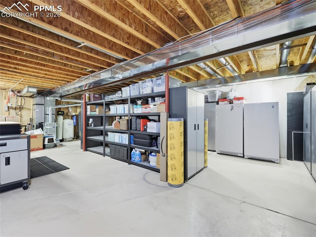 12855 Murphy Road Elbert, CO 80106 - Photo 36 of 50 a view of a garage with furniture