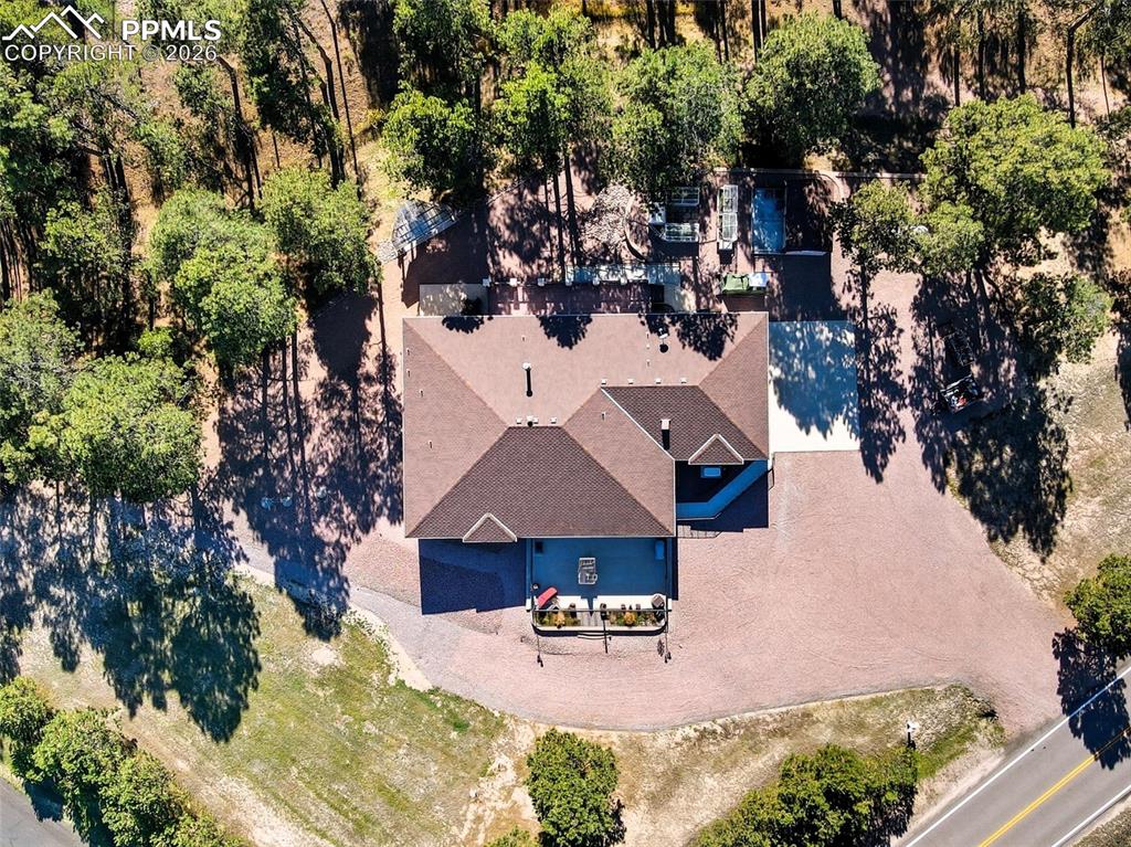 12855 Murphy Road Elbert, CO 80106 - Photo 4 of 50 an aerial view of a house with outdoor space