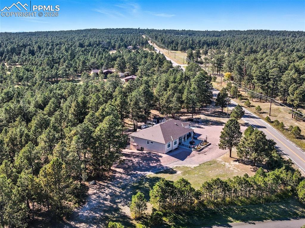 12855 Murphy Road Elbert, CO 80106 - Photo 47 of 50 an aerial view of a house with a yard