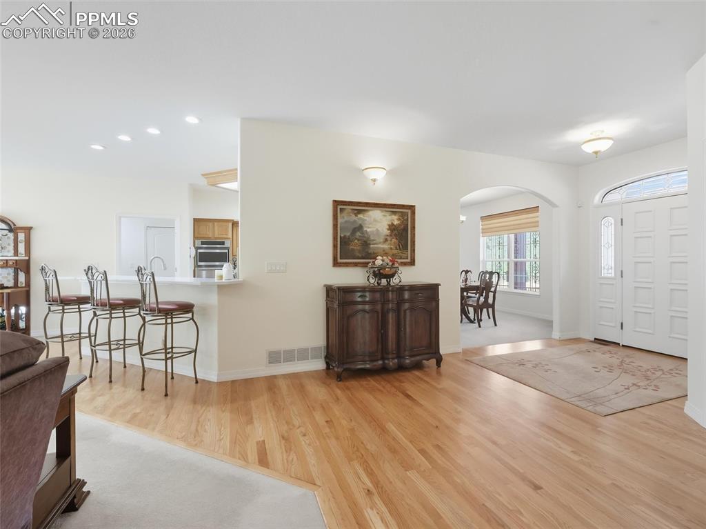 12855 Murphy Road Elbert, CO 80106 - Photo 5 of 50 a living room with furniture wooden floor and a wooden floor