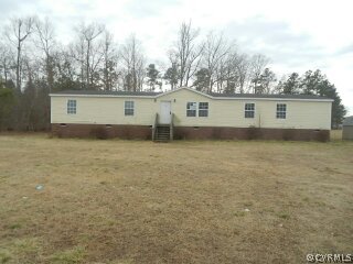 20075 Rainey Road Dinwiddie, VA 23841 - Photo 1 of 10 front view of house with a yard