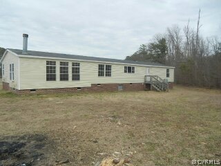 20075 Rainey Road Dinwiddie, VA 23841 - Photo 8 of 10 front view of house with a yard