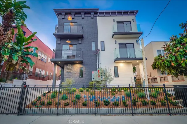 a view of a house with a street