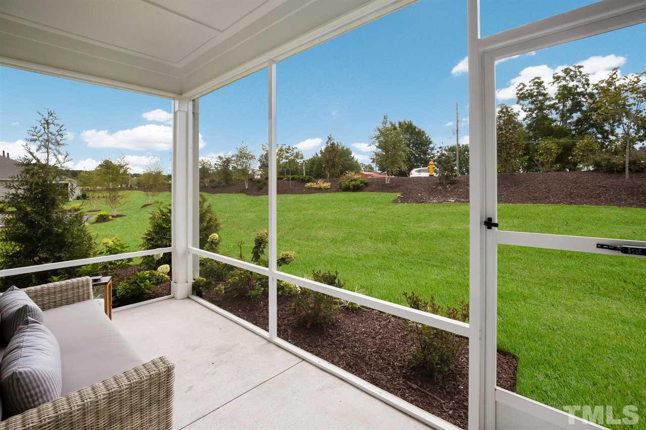 244 Mahogany Run, Unit 192 Raleigh, NC 27610 - Photo 26 of 30 a view of a back yard from a balcony