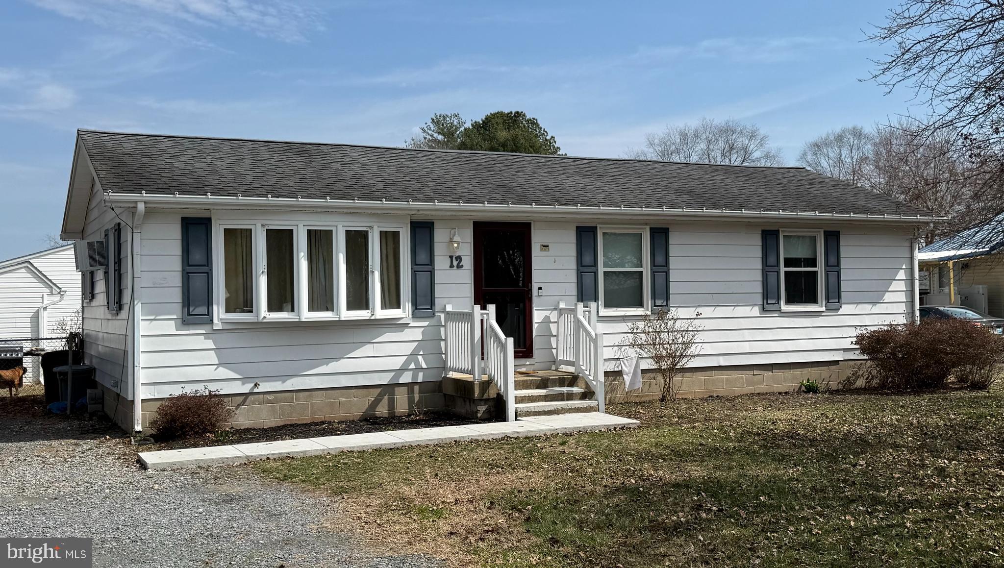 a front view of house with yard
