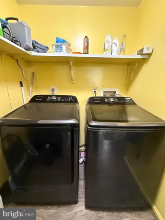 a close up of a sink and a stove