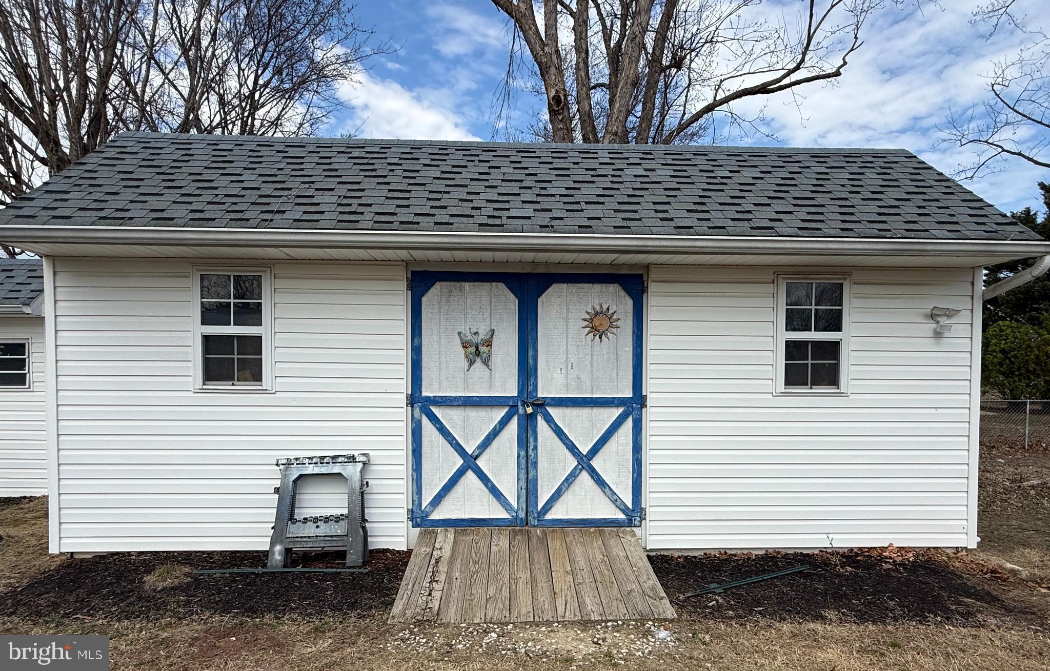12 North Maple Avenue Ridgely, MD 21660 - Photo 19 of 23 a front view of a house with a yard