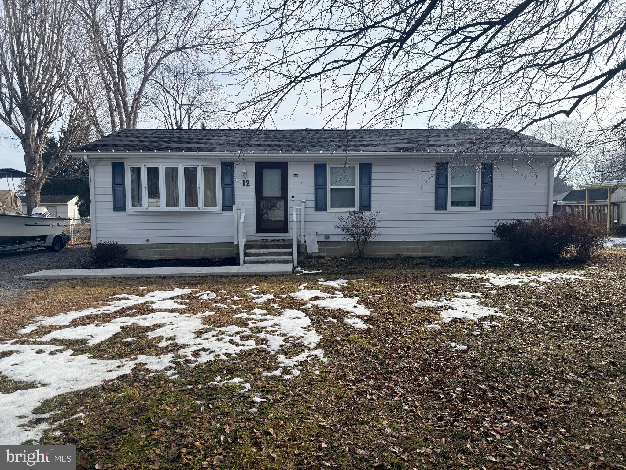 12 North Maple Avenue Ridgely, MD 21660 - Photo 2 of 23 a front view of a house with a yard