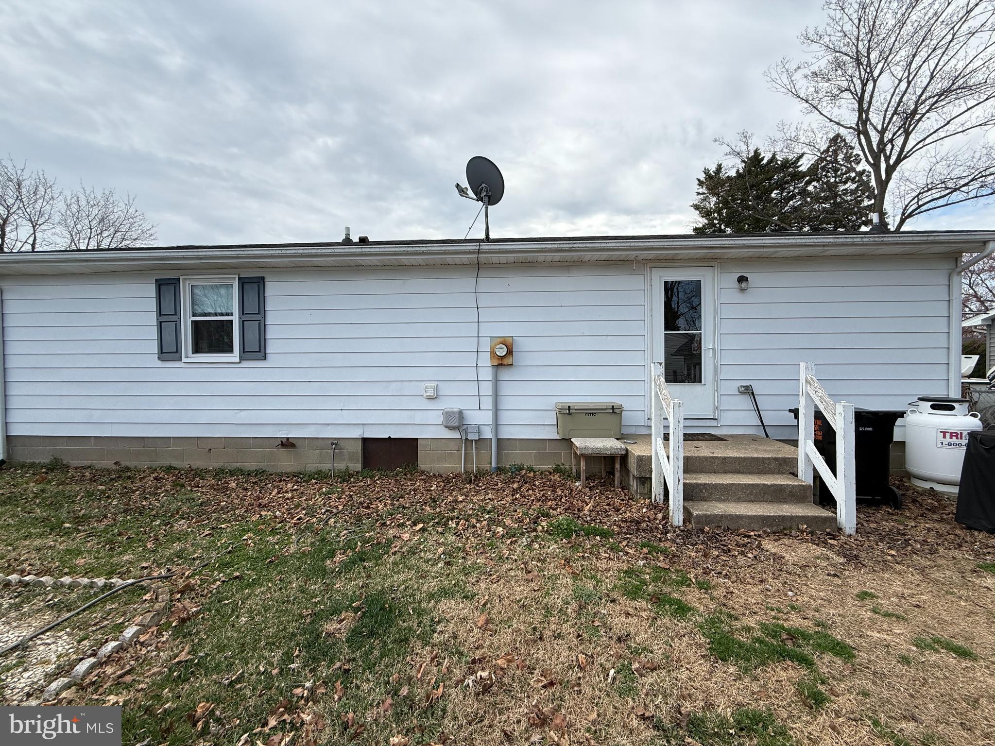 12 North Maple Avenue Ridgely, MD 21660 - Photo 23 of 23 a front view of a house with a yard