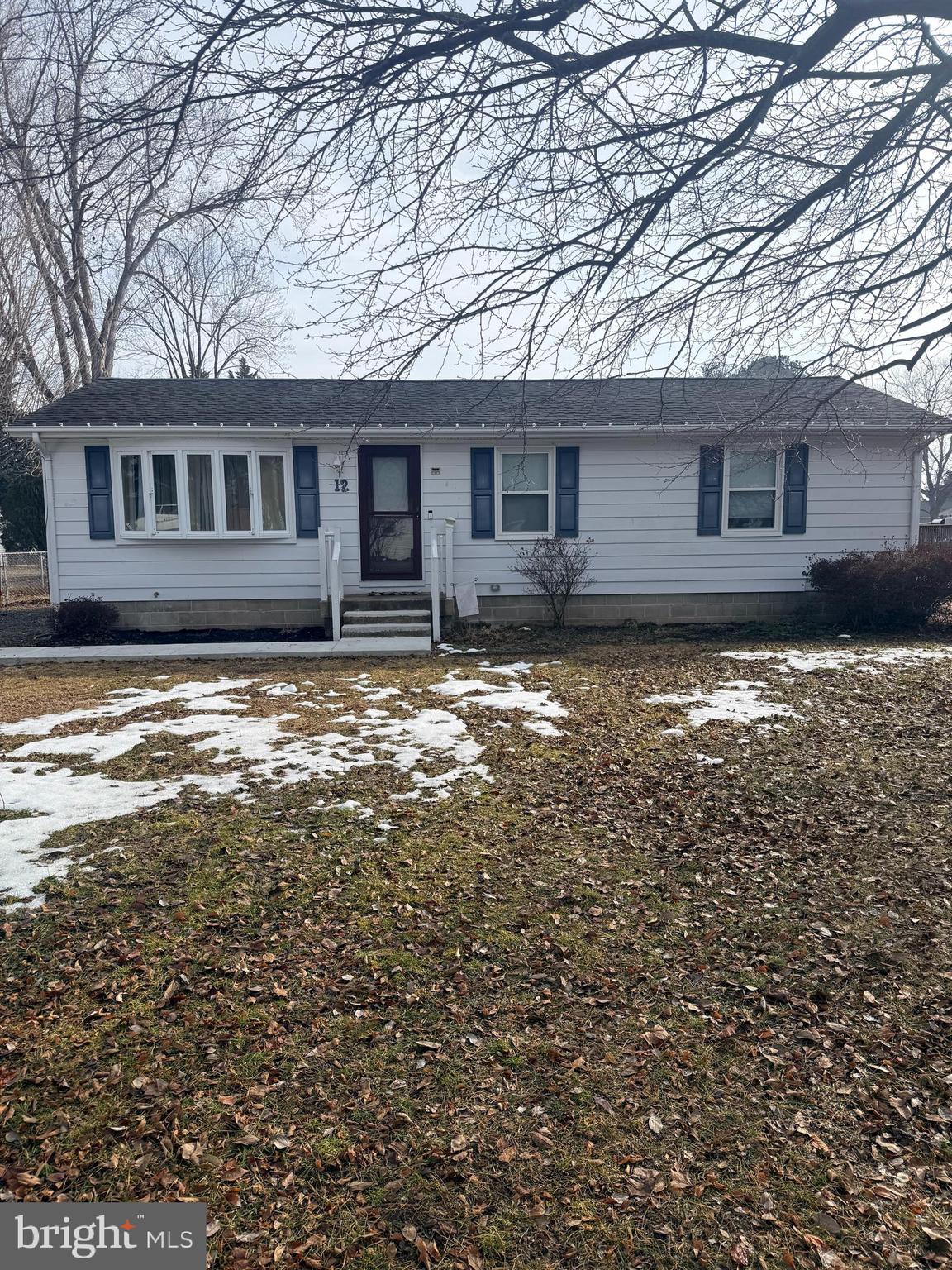 12 North Maple Avenue Ridgely, MD 21660 - Photo 3 of 23 a front view of a house with a yard
