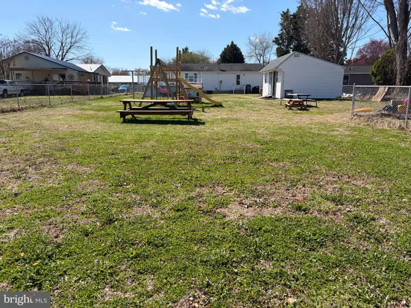 a view of a swimming pool with lounge chair