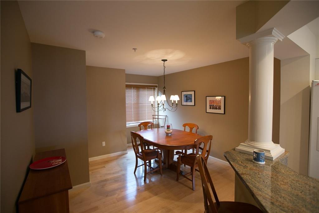 96 Locke Village Road, Unit I2 Newry, ME 04261 - Photo 8 of 34 Dining Area with new hardwood floors